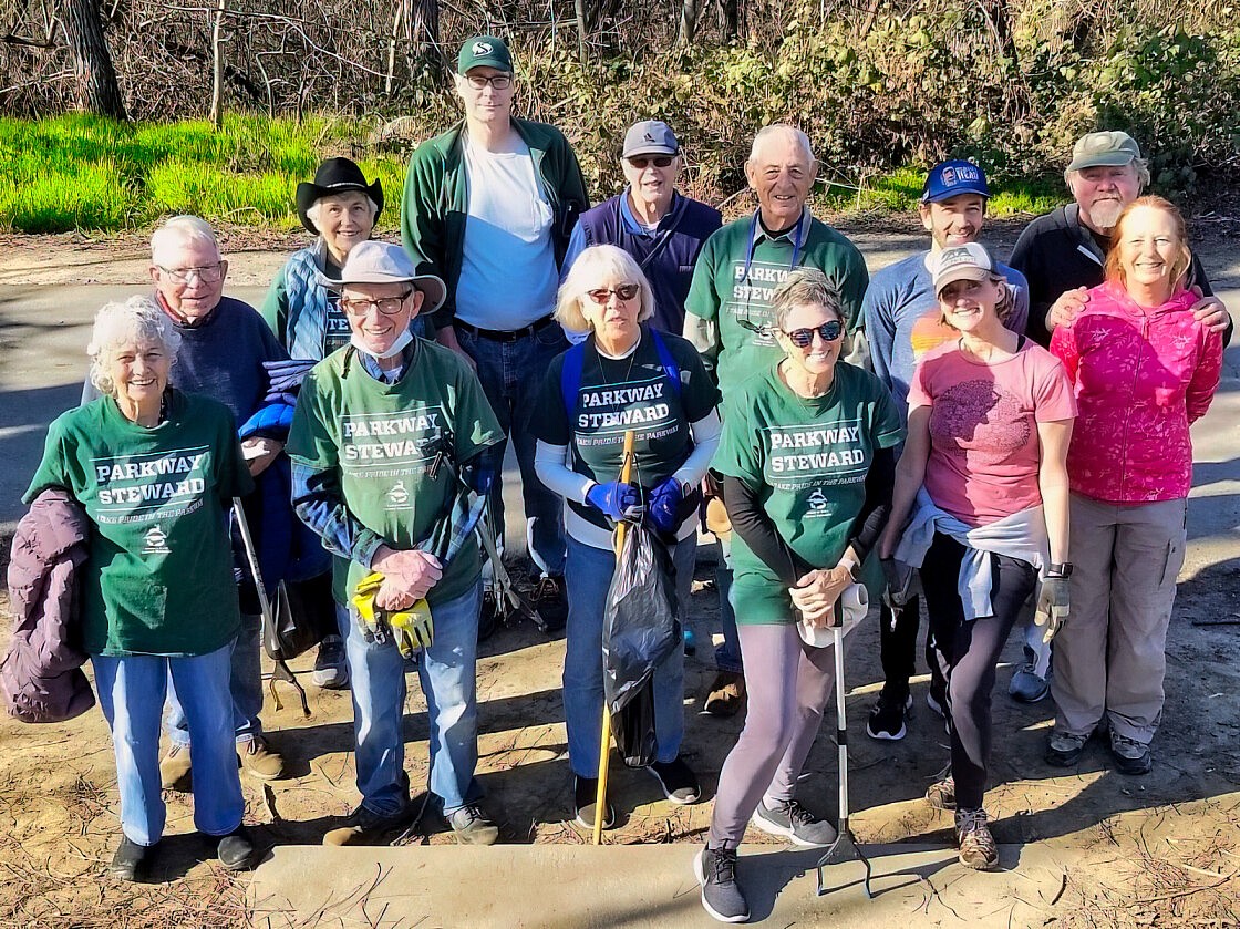 (Front Row: Left to Right: Betty Crockford, Jeff Voeller, Shirley Paulson, Catherine O’Brien, Rachel Nickel. Susan Davis-James; Second Row (L to R): Lloyd Crockford, Linda Brandenburger, Duncan Barrow, John Abbott, Dave Dawson, Ryan Nickel, Richard MacGill. Photo by Eric Ross)