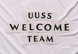 a-banner-that-says-uuss-welcome-team-on-a-simple-w-O1KcD0YmTpaZ_N60znFWOA-Bouha-Y2QvOi-RsjJW9Uww