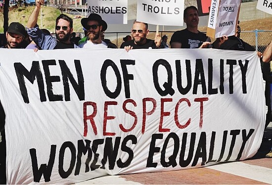 2024-09-26 11_28_05-Men holding white, black, and red Men of quality respect womens equality banner