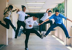 Group-of-people-doing-jump-shot-topaz